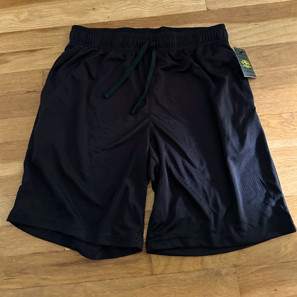 NWT Men’s medium black shorts. Smoke free home.